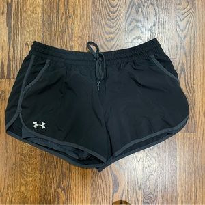 Under Armour Shorts.  Black.  Shorts underneath.  Size Medium